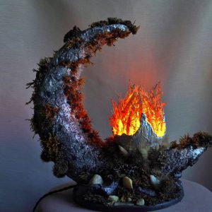 Handmade moon lamp with glowing fire center