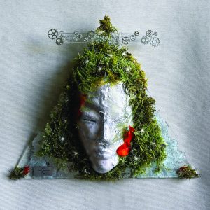 Handmade Gemini zodiac wall sculpture with moss and glass.